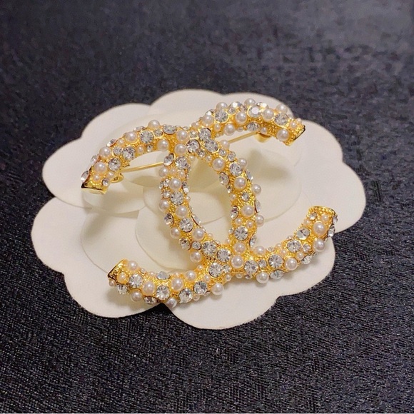 CHANEL Jewelry - CHANEL Gold and Pearl CC Brooch